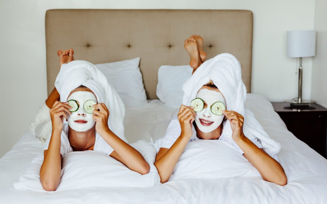 Two women with face masks on their faces