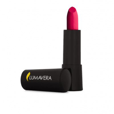 A lipstick that is sitting on top of a black tube.