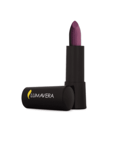 A purple lipstick is sitting in a black tube.