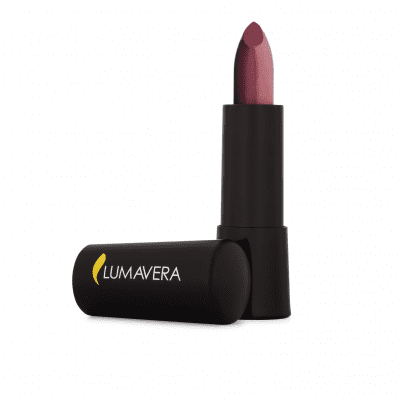 A lipstick that is sitting on top of a black tube.