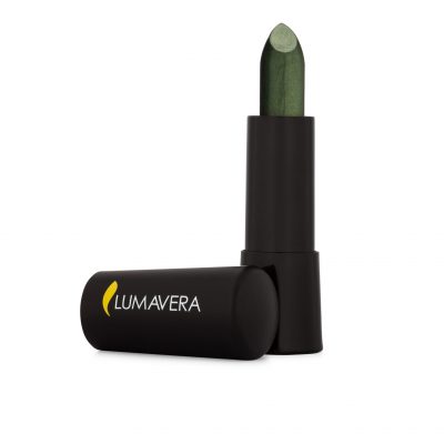 A green lipstick is sitting in its tube.
