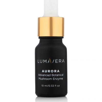 A bottle of serum with gold cap.